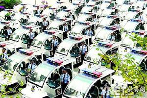 李春平捐70辆`甲壳虫`警车 为出警提速(图)